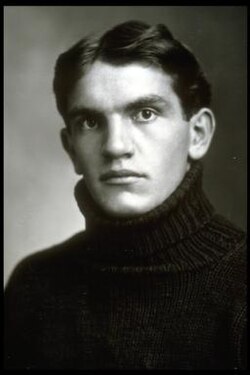 Vintage archival portrait of Michigan Wolverines legendary center Adolph 'Germany' Schulz. Black and white headshot showing Schulz in a high-collar turtle-neck wool football sweater from the early 1900s. A primary source for Fielding Yost era research and Pigskin Dispatch archives.