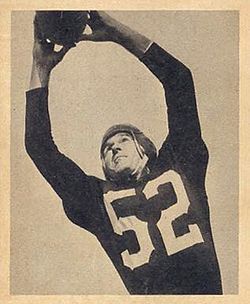 Vintage 1948 Bowman Harry Gilmer rookie card. Black and white archival image of Washington Redskins quarterback Harry Gilmer (#52) in a jump-pass pose wearing a leather helmet. A primary source for historical NFL draft and Alabama Crimson Tide research for Pigskin Dispatch archives.