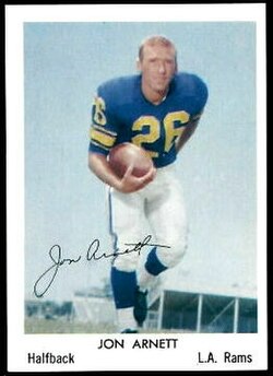 Vintage 1959 Fleer Jon Arnett football card (#24). Colorized archival image of Los Angeles Rams halfback 'Jaguar Jon' Arnett (#26) in a running pose. A primary source for historical NFL draft research and USC Trojans football archives for Pigskin Dispatch.