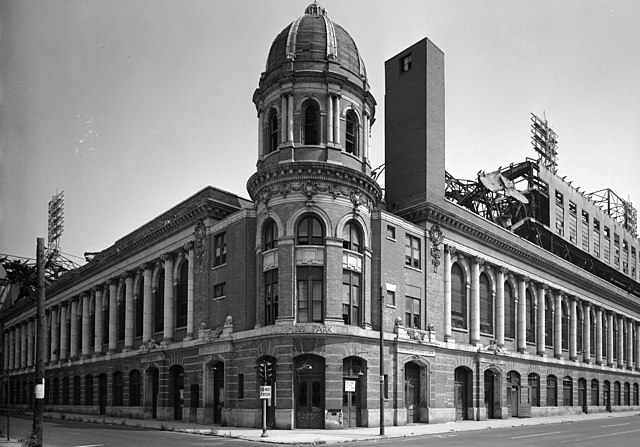 Historical 1973 archival photograph of Shibe Park (Connie Mack Stadium) in Philadelphia. Black and white exterior view of the ornate domed tower and brick facade during its demolition era. A primary source for historical NFL stadium research and Pigskin Dispatch archives.