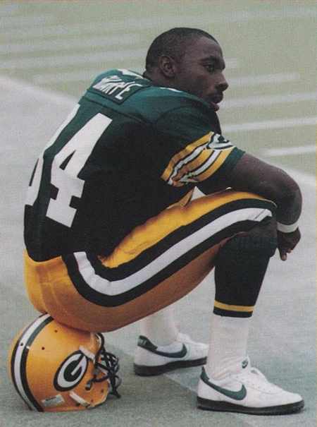 Sideline portrait of Packers great Sterling Sharpe (#84), a five-time Pro Bowler whose dominant career remains a hallmark of 1990s NFL history.