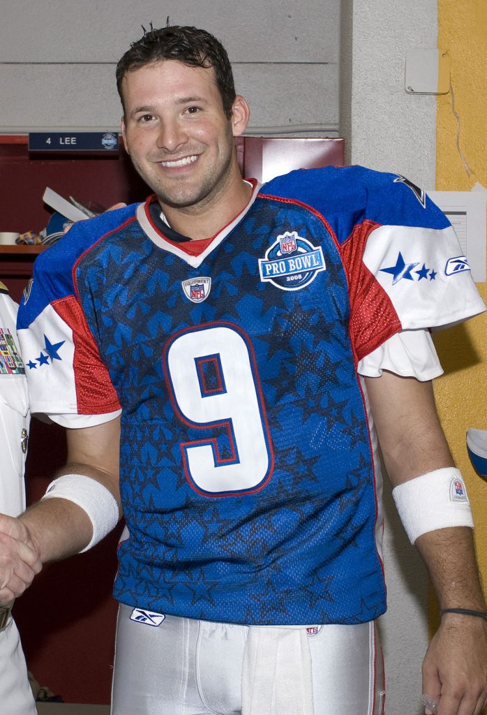Color image of Tony Romo, quarterback with the Dallas Cowboys before playing in the 2008 NFL Pro Bowl at Aloha Stadium in Honolulu, Hawaii on February 10, 2008. Romo sports a blue NFC number 9 jersey