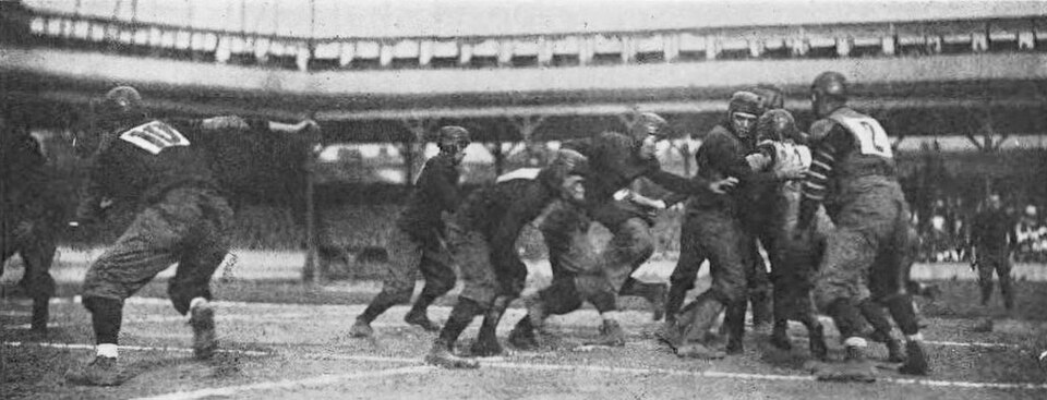black and white action photo of 1908 University of Pittsburgh football game