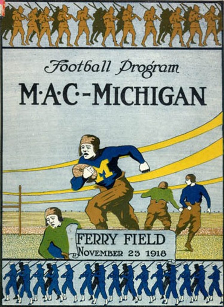 Vintage 1918 Michigan vs. M.A.C. (Michigan Agricultural College) football program cover. Features a Michigan player in a blue jersey with a yellow Block M and leather helmet at Ferry Field. Bordered by marching WWI soldiers and sailors. A primary source for 1918 National Championship and Spartans-Wolverines rivalry research for Pigskin Dispatch archives.