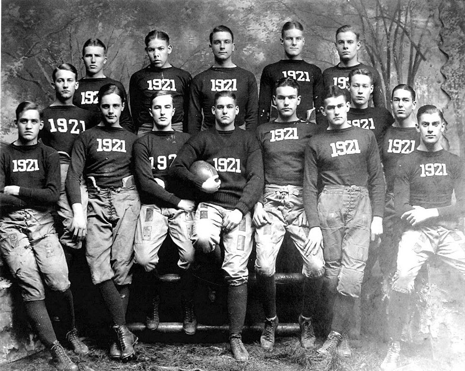 Vintage black and white team photo of the Yale Buldogs 1921 football team.