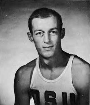 A black and white publicity image of Terry Baker Oregon State in his OSU basketball uniform
