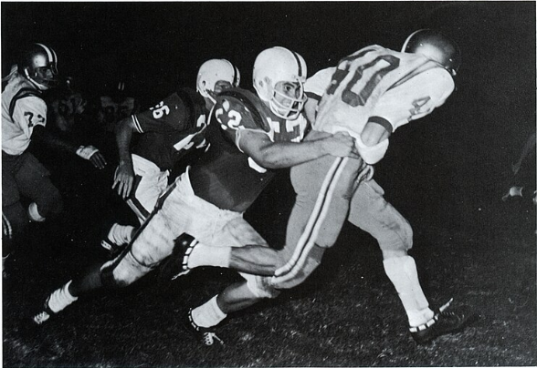 black and white game action shot of Louisiana Tech's 1966-1967 Bulldog football team. Page 373 of the yearbook mentions Phil Robertson and <a rel=