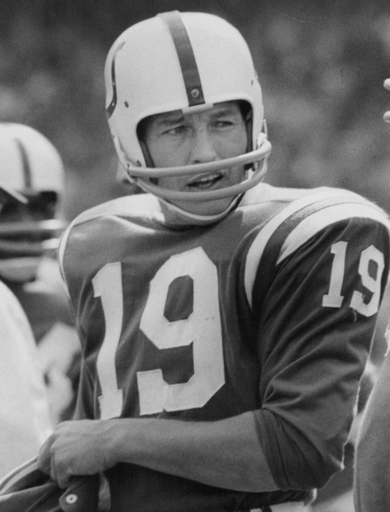 Black and white upper torso game shot of Colts #19 Johnny Unitas in full uniform 1967