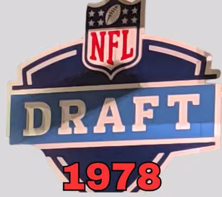 NFL Draft sign in color on a white background with the year 1978 text across the bottom in red. The original cropped image was taken by Darin Hayes at AT&T Stadium in 2022.