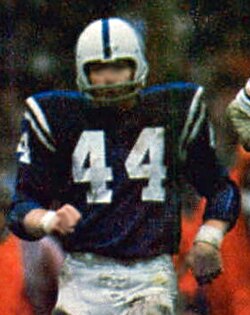 Full color blurred image of Rex Kern in 1971 suited up in his dark blue Baltimore Colts uniform jersey 44.