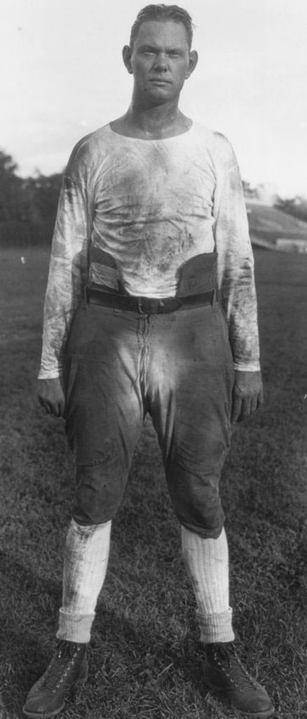 Black and white full body image of Bernie Shively in 1929 wearing his practice uniform as the head coach of Kentucky.