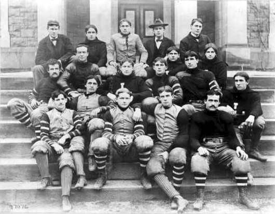 Vintage 1986 black and white team photo of the Lafayette football team.