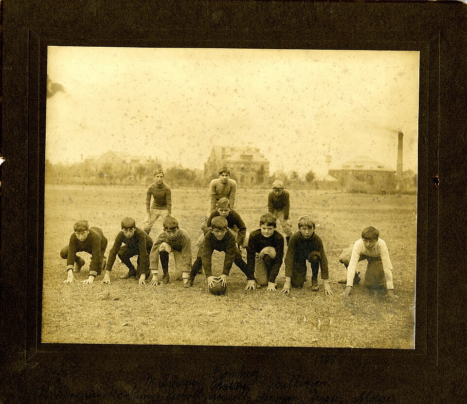 Vintage and yellowed with age team phooto of Handwritten inscription on reverse reads: "2nd Loyola Football Team." Loyola College was a predecessor to Loyola University New Orleans.