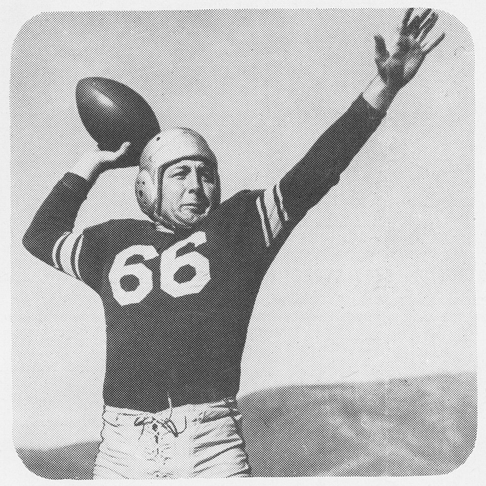 VIntage black and white publicity photo of CharleyO'Rourke-1948 as a Baltimore Colt in his dark number 66 jersey posed to throw a pass.