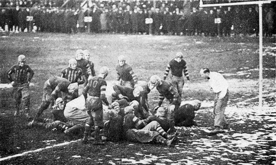 Vintage black and white game action photo fo Ohio State vs Case 1916 football. November 18, 1916 at Van Horn Field. Cleveland, OH. Present day Case Western Reserve Spartans and Ohio State Buckeyes.