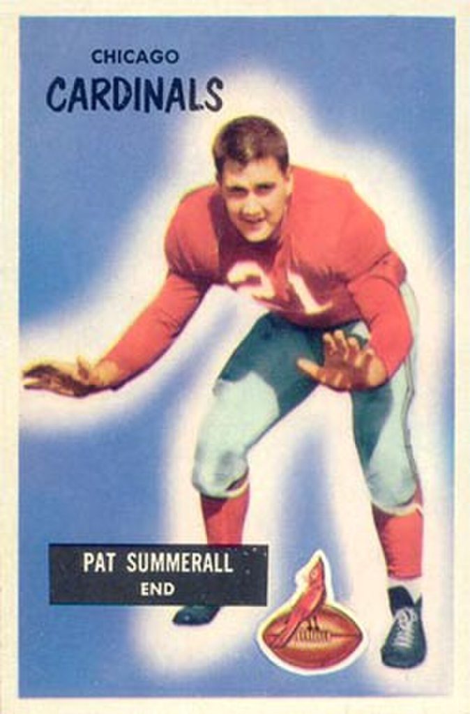 Color photo image of American football player Pat Summerall on a 1955 Bowman card wearing his red Chicago Cardinals jersey, with a number 21.