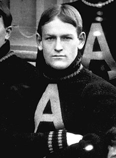 Vintage black and white cropped image of Paul Bunker in his Army football sweater