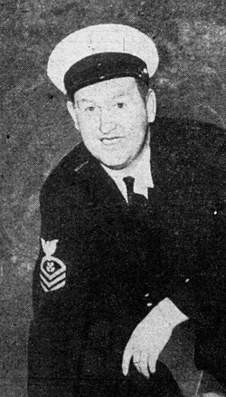 Black and white newspaper image of American football player Paul Schwegler in full military uniform