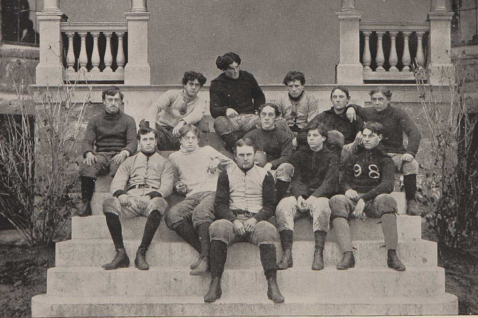 Vintage black and white team photo of the Rhode Island football team in 1896