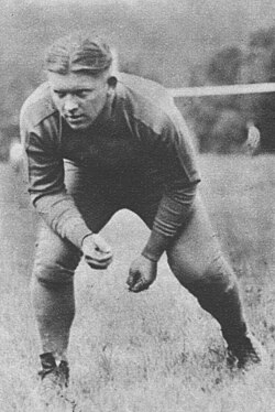 Vintage black and white image of Joe "Mugsy" Skladany, Pittsburgh', 1932 in a football pose