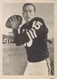 Vintage black and white publicity passing pose of Tom Flores in 1961 Fleer Wallet photo for Oakland Raiders