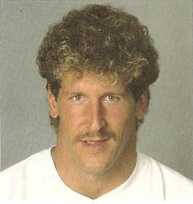 A color promotional photo of American football player Tom Cousineau in 1985.