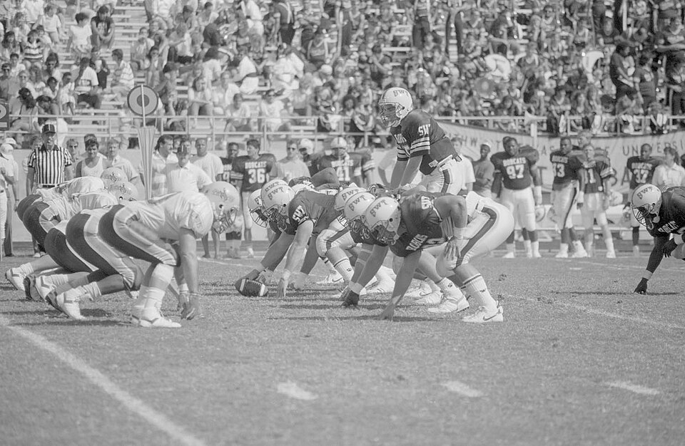 Black and white game action photo of Date: 10/22/1988 File Number: 9030 Assignment: Homecoming 1988: Homecoming Football - Pre-game Half-time Presentation - Homecoming A-Fair - Gaillardians.