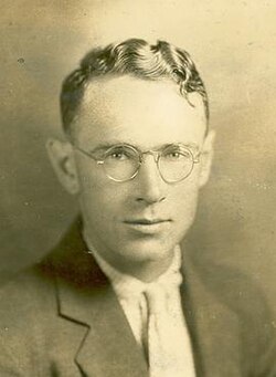 Vintage black and white year book head shot image of Rollins College football coach/ad Jack McDowall