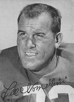 Black and white pblicity head shot of San Francisco 49ers line man Leo Nomellini in 1961 wearing his number 73 jersey and shoulder pads.