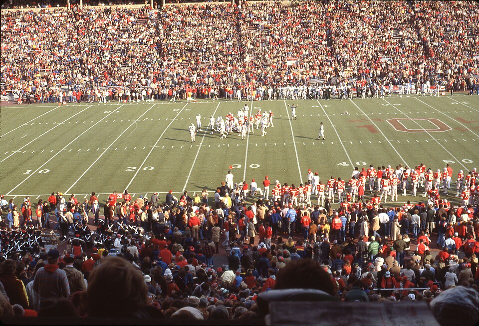 Upper stadium full color, sideline view of A view inside a crowded Ohio Stadium during a football game between the Ohio State University Buckeyes and the Michigan State University Spartans, 1981.