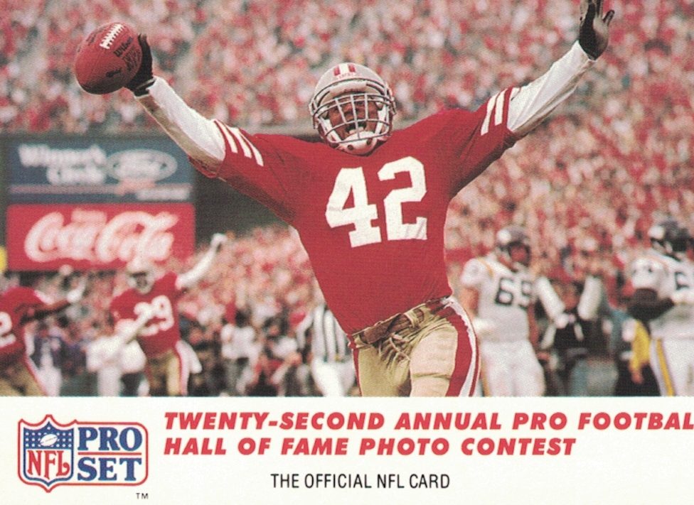 Ronnie Lott 1989 on 1990 Pro Set trading card.  SF Red jersey 42