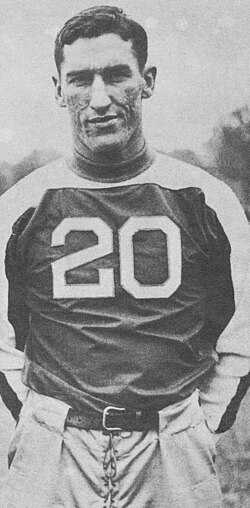 Black and white publicity shot of Stafford-Harrison-1934 in his jersey number 20 Texas uniform