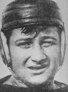 Vintage black and white head shot of Photograph of Stanley "Bags" Pennock, 1914 in leather helmet of the era.