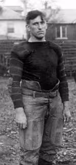 Vintage publicity shot of a 3/4 view of Vanderbilt player Josh Cody in football uniform, 1919.