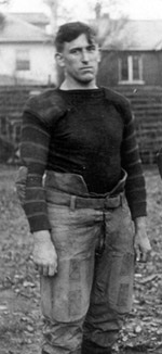 Vintage publicity shot of a 3/4 view of Vanderbilt player Josh Cody in football uniform, 1919.