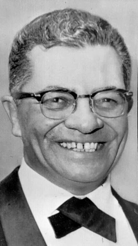 Black and white 1960s era publicity head shot (cropped) of Vince Lombardi