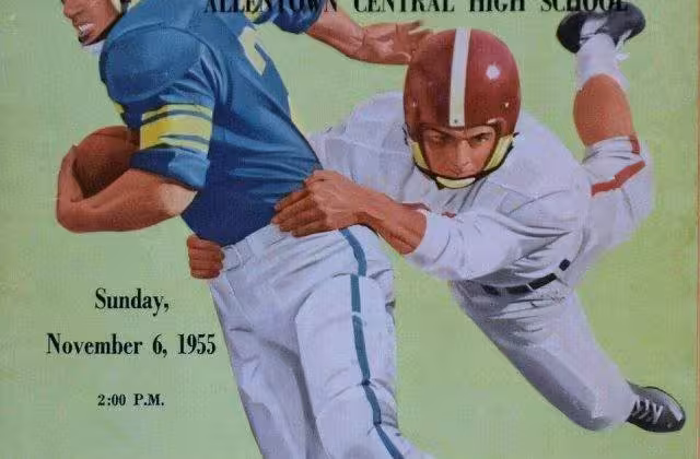 Full color artists rendering of an American football player in a blue jersey running with the ball avoiding a defender clad in white as part of Cover of a football program dated 1955.