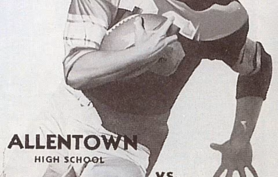 black and white hand drawn image of a 1950s American football player carrying the ball ona game day program for Allentown High School Football Program Date 1957 Source Allentown High School, Allentown PA