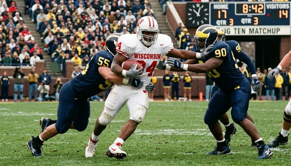 AI-created image of college football action in 1996 having any player gear shown being period correct and verified