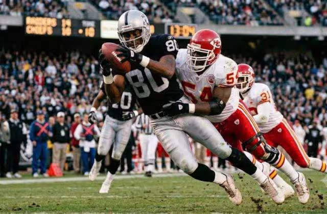 AI-created image of American football action in 2000 having any player gear shown being period correct and verified