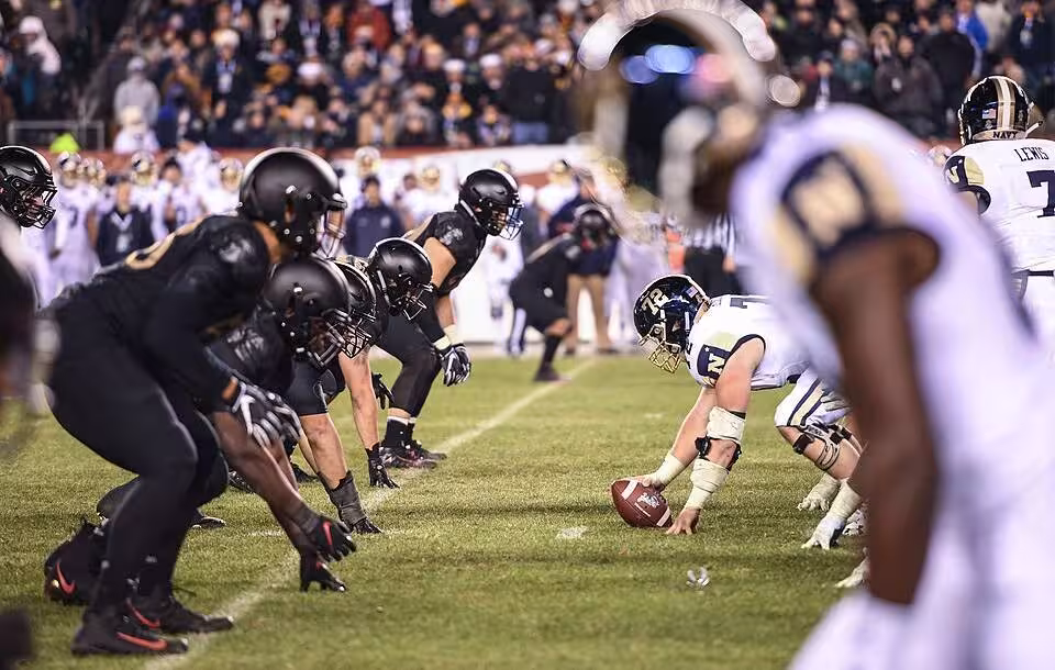 Full color image of The U.S. Military Academy West Point defensive line prepares for a play during the 119th Army-Navy Game in Philadelphia Dec. 8, 2018. The Army defeated the Navy for the third year in a row. (U.S. Army photo by Spc. Dana Clarke) www.dvidshub.net/