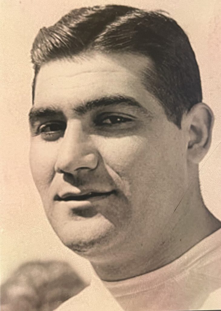 Vintage black and white publicity head shot of Alex Sarkisian 1949