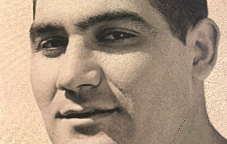 Vintage black and white publicity head shot of Alex Sarkisian 1949