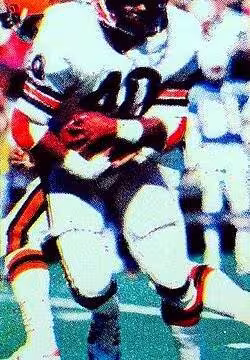 Full color game action shot of Cincinnati Bengals running back Charles Alexander rushing the ball against the Houston Oilers during a September 28, 1980 home game at Riverfront Stadium.