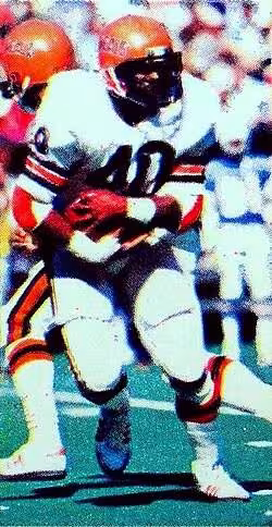 Full color game action shot of Cincinnati Bengals running back Charles Alexander rushing the ball against the Houston Oilers during a September 28, 1980 home game at Riverfront Stadium.