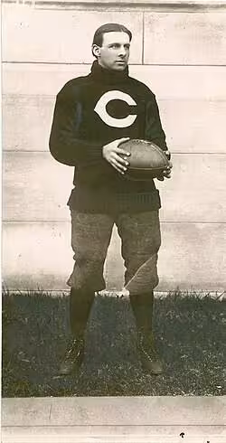 Vintage black \and white full body publicity photo of Clarence Bert Herschberger, in his University of Chicago uniform
