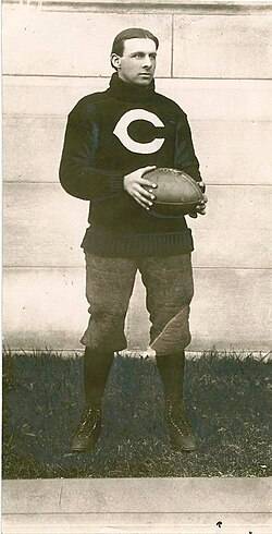 Vintage black \and white full body publicity photo of Clarence Bert Herschberger, in his University of Chicago uniform