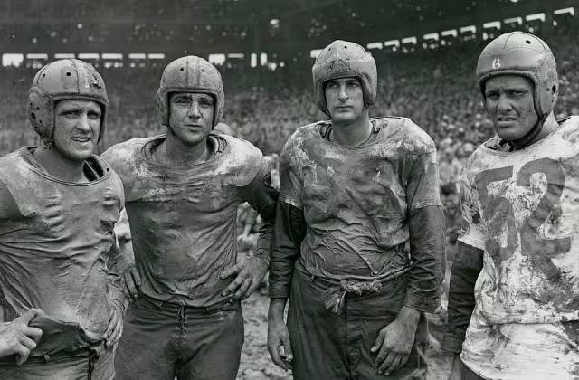 Four of Navy's Mudstained Stars Pose After the Army and Navy Football Game on the Fourth of July at Rizal Stadium, Manila, Philippines - NARA - 45697721.jpg Scope and content: Original Caption: Four of Navy's mudstained stars pose after the Army and Navy football game on the Fourth of July at Rizal Stadium, Manila, P.I. Left to Right: Geyer, Bloomfield, New Jersey; Hall, Chicago, Illinois; Horjes, Tacoma, Washington; Youngberg, Woodstock, Illinois.