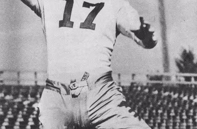 Black and white publicity football passing pose photo of Single-wing tailback Isbell set a new NFL record for passing in 1941, throwing for 1,479 yards.
