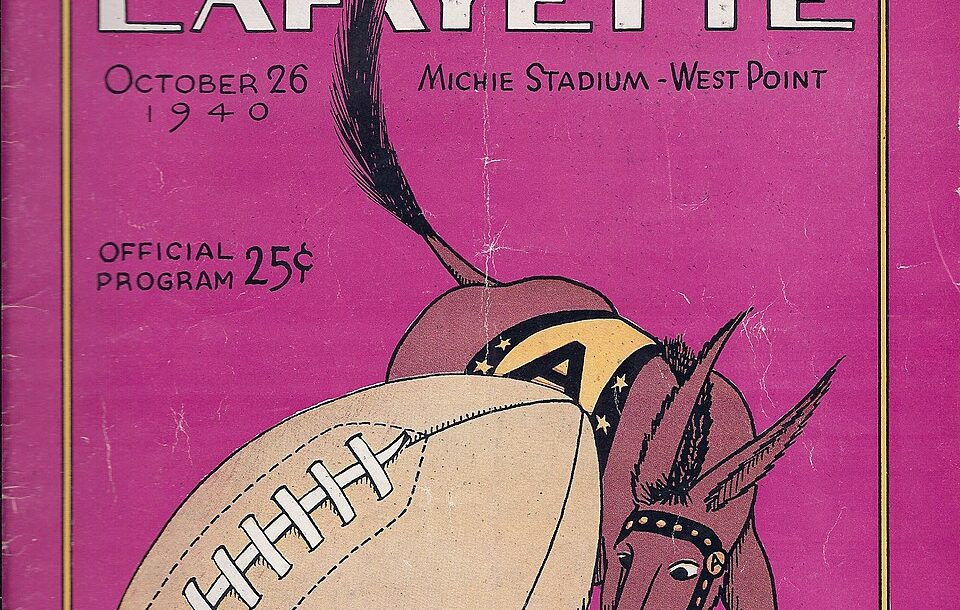 Full color purple back ground with a Army mule image with a football, The cover of the October 26, 1940 football game program between Lafayette College and the U.S. Military Academy, West Point, NY. U.S.M.A.